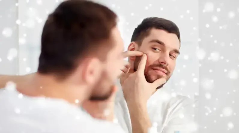 Man with Acne Flareup in Winter