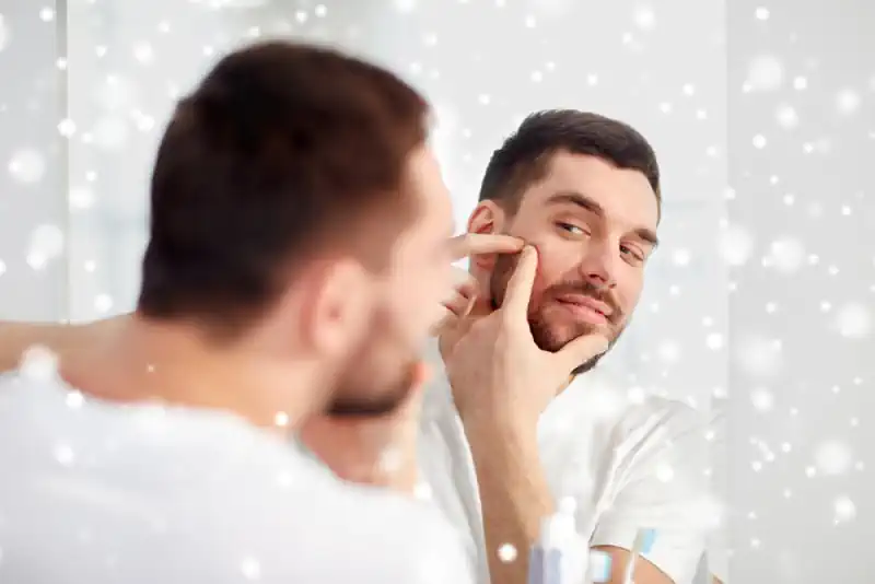 Man with Acne Flareup in Winter