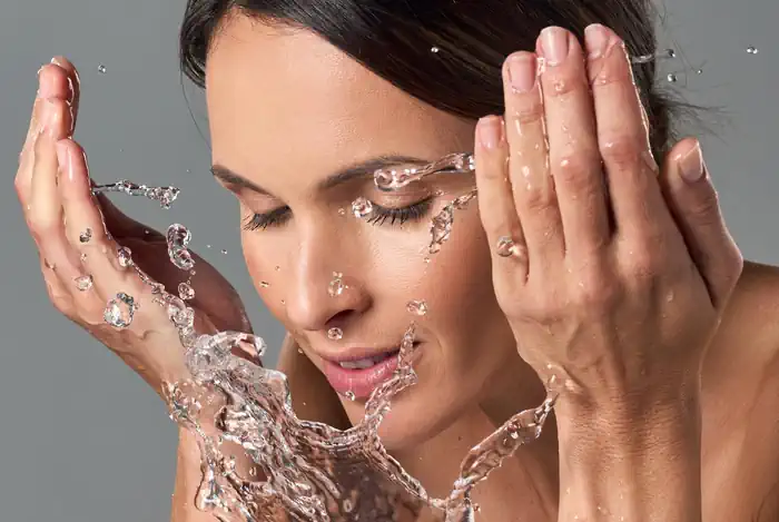 Woman Cleansing her Face